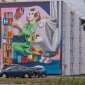 Уличные художники украсили пятиэтажку в башкирском Благовещенске красочным панно